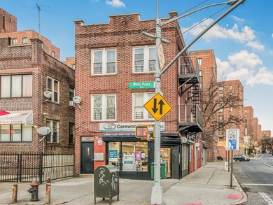 Detached brick mixed-use building with R6 zoning located on busy - photo 27