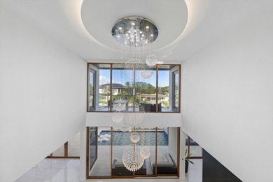 Experience unparalleled modern waterfront luxury in prestigious - photo 30
