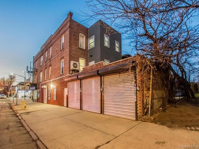 Detached brick mixed-use building with R6 zoning located on busy - photo 32