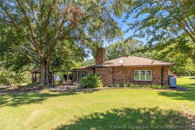 Welcome to 88 Traceway, a spacious all-brick, single-story - photo 47