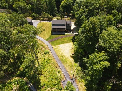 Year-round lake views, a private dock, and enough space for the - photo 2
