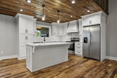 Year-round lake views, a private dock, and enough space for the - photo 9