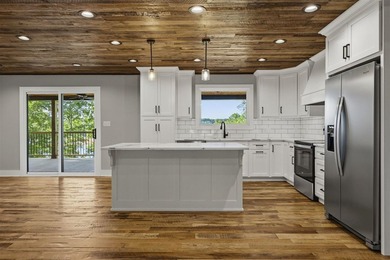Year-round lake views, a private dock, and enough space for the - photo 10