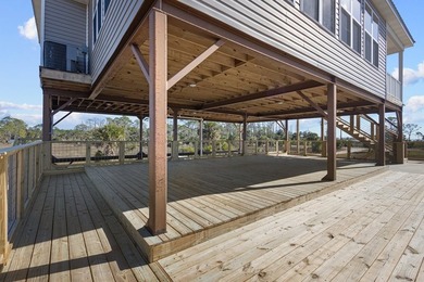 Rare opportunity in Ezell Beach! This elevated two-bedroom, one - photo 11