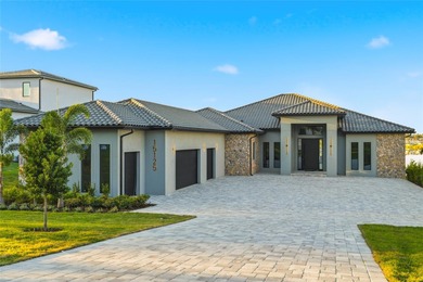 A contemporary Mediterranean lakefront masterpiece, this - photo 2