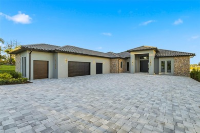 A contemporary Mediterranean lakefront masterpiece, this - photo 3
