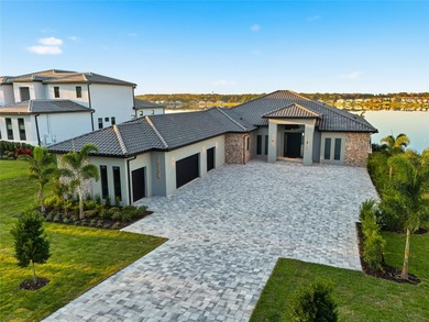 A contemporary Mediterranean lakefront masterpiece, this - photo 4