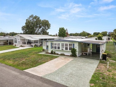Welcome to easy living in Citrus Woods, an active 55+ community! - photo 4