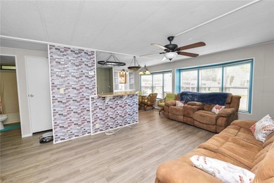 Welcome to easy living in Citrus Woods, an active 55+ community! - photo 10