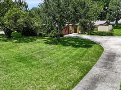 Welcome home to this stunning lakefront 4-bedroom, 2-bath - photo 2