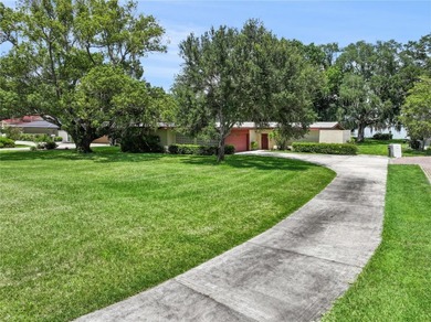 Welcome home to this stunning lakefront 4-bedroom, 2-bath - photo 3