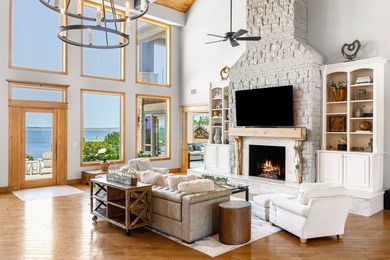 Experience elevated lakefront living in this extraordinary - photo 12