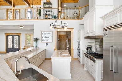 Experience elevated lakefront living in this extraordinary - photo 15