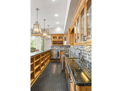 Experience elevated lakefront living in this extraordinary - photo 19