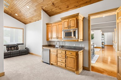 Experience elevated lakefront living in this extraordinary - photo 31