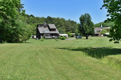 Unlock the potential of this charming lakefront fixer-upper on - photo 2