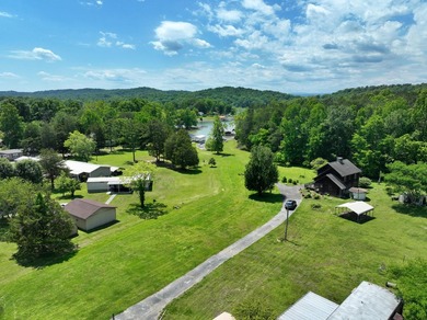 Unlock the potential of this charming lakefront fixer-upper on - photo 3