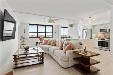 Experience elevated coastal living in this immaculate, fully - photo 6