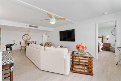Experience elevated coastal living in this immaculate, fully - photo 10