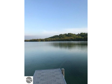 Lake Acreage For Sale in Maple City, Michigan