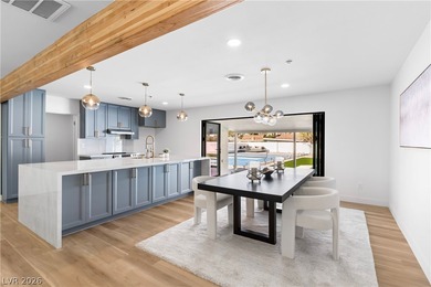 Fully remodeled with high-end finishes throughout, this stunning