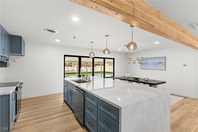 Fully remodeled with high-end finishes throughout, this stunning