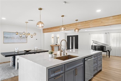 Fully remodeled with high-end finishes throughout, this stunning