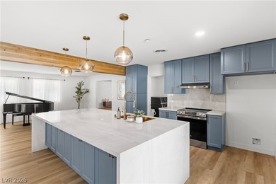 Fully remodeled with high-end finishes throughout, this stunning