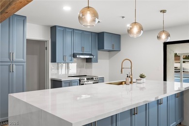 Fully remodeled with high-end finishes throughout, this stunning