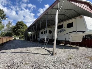 Lake property with campers and hookups. Don't miss this unique - photo 1