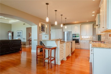 Welcome to waterfront living at its finest. Perched above the - photo 16