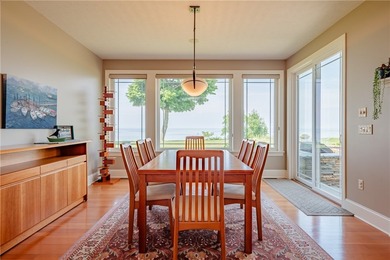 Welcome to waterfront living at its finest. Perched above the - photo 17