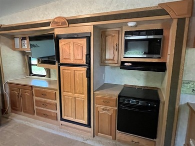 Lake property with campers and hookups. Don't miss this unique - photo 9