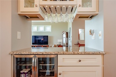 Welcome to waterfront living at its finest. Perched above the - photo 20