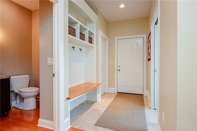 Welcome to waterfront living at its finest. Perched above the - photo 26