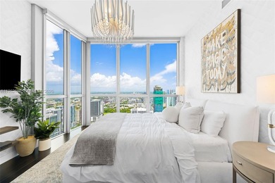 Exceptional corner 4-bedroom, 4.5-bathroom 2-story Sky Residence