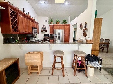 Fabulous 3/2/2 family pool home on an oversized lot. It has an - photo 12