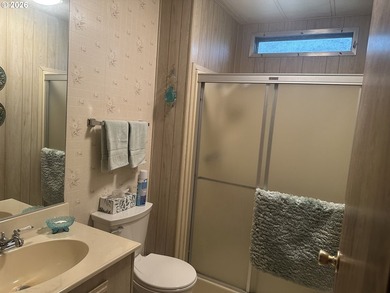 This well-maintained manufactured home is tucked in the hills - photo 8