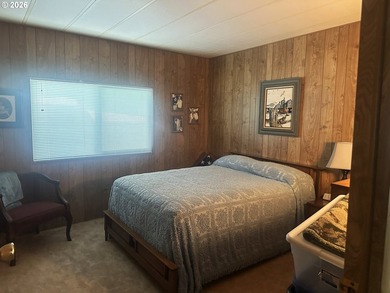 This well-maintained manufactured home is tucked in the hills - photo 9