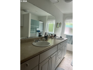 This well-maintained manufactured home is tucked in the hills - photo 10