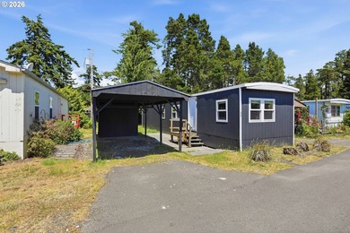 Move-in ready and fully remodeled! This 2-bedroom, 1-bath home - photo 1