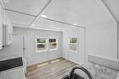 Move-in ready and fully remodeled! This 2-bedroom, 1-bath home - photo 9