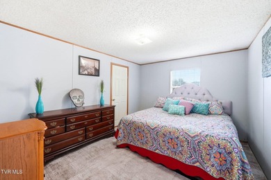 Perched on over 2 acres with breathtaking mountain views, this - photo 20