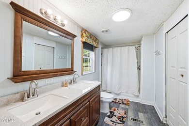 Perched on over 2 acres with breathtaking mountain views, this - photo 25