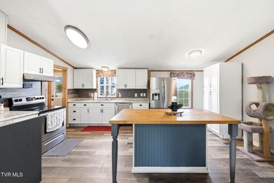 Perched on over 2 acres with breathtaking mountain views, this - photo 32