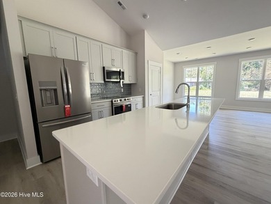 Located in the lakefront community of the Bluffs with a lovely - photo 3