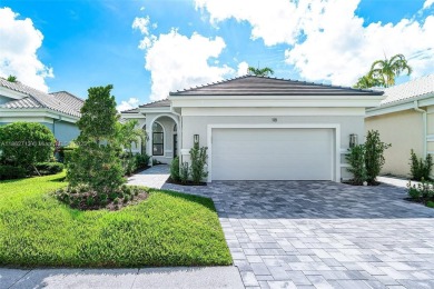 Lake Home For Sale in Palm Beach Gardens, Florida