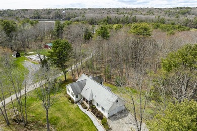 This custom ranch offers refined one-floor living with three - photo 3