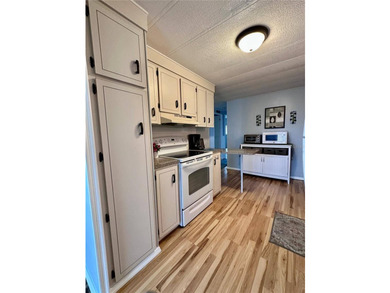 Virtually Staged. Located in a quiet and favorable area within - photo 12