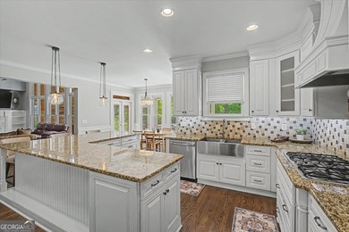 Golf-front Bentwater brick home with a private pool, a three-car - photo 13